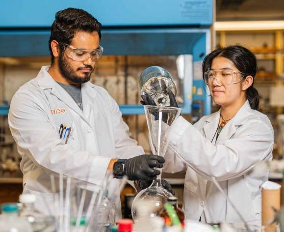 Two students in a research lab